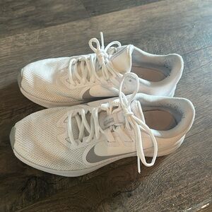 White nike running/athletic shoe